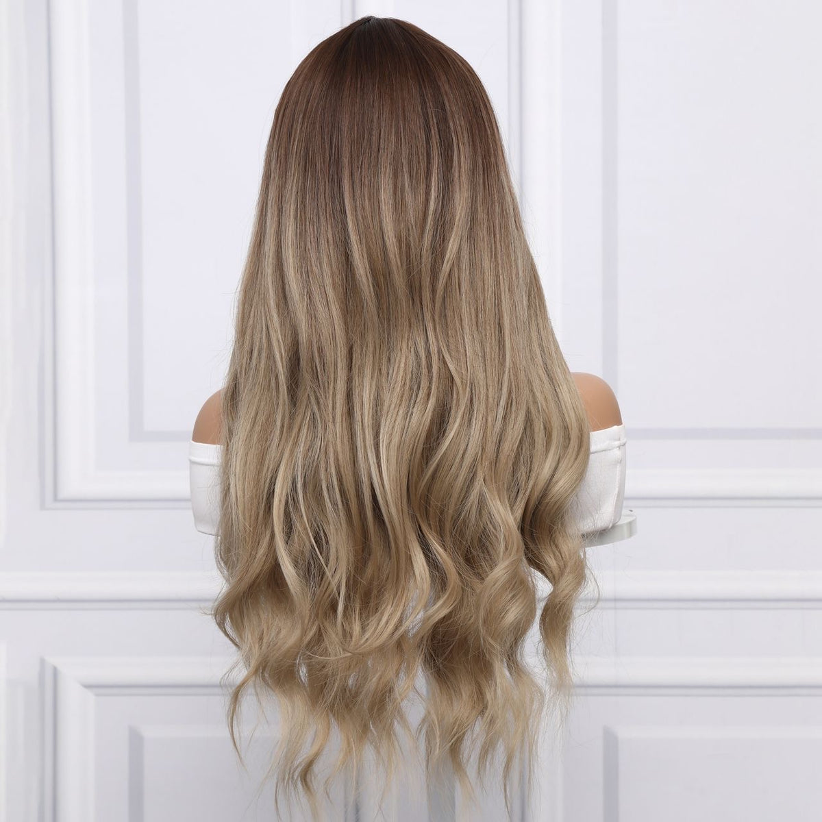 Long wavy synthetic wig, dark roots, back view, dirty blonde waves