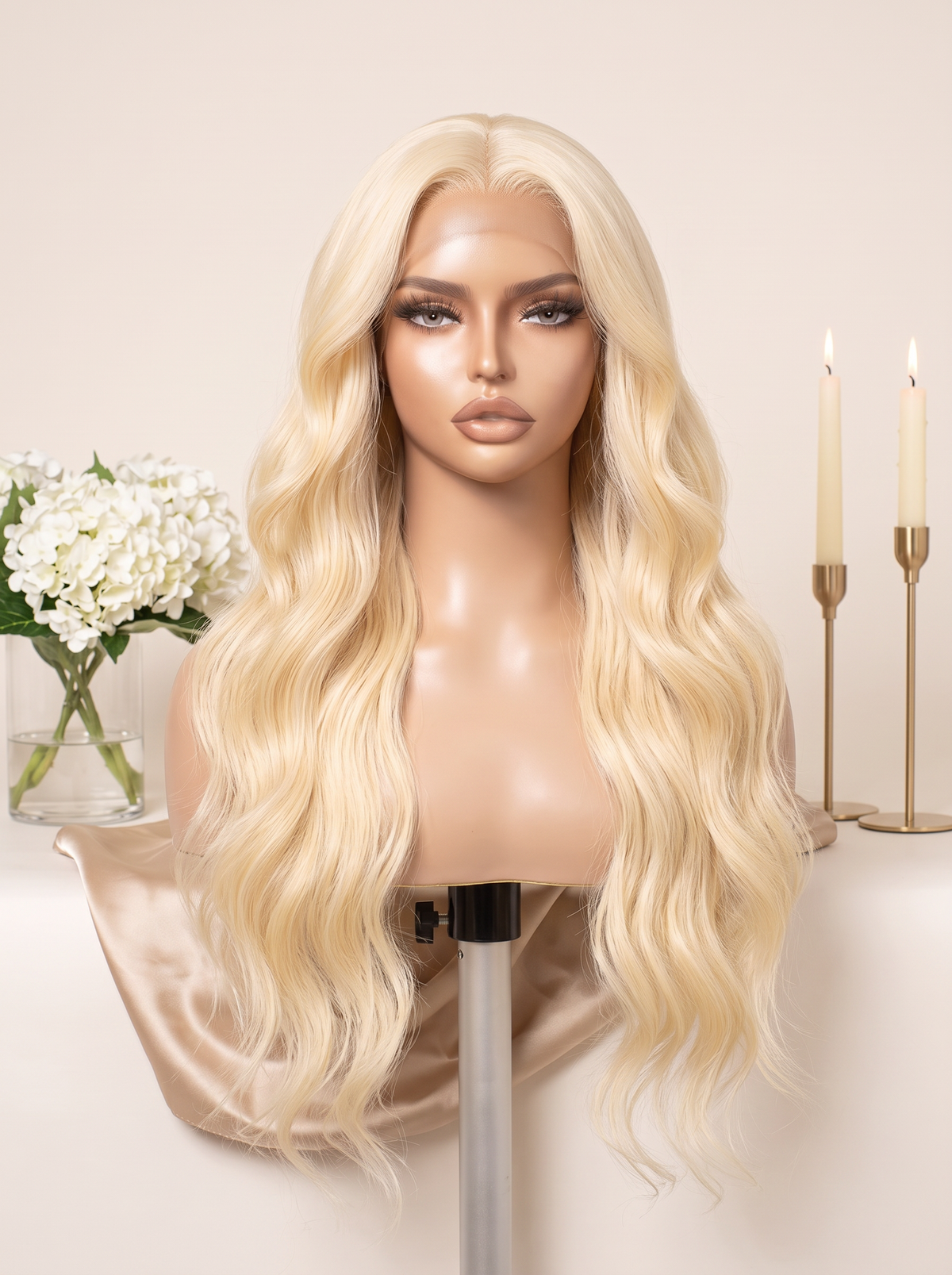 Blonde lace wig on mannequin, long loose waves and soft shine