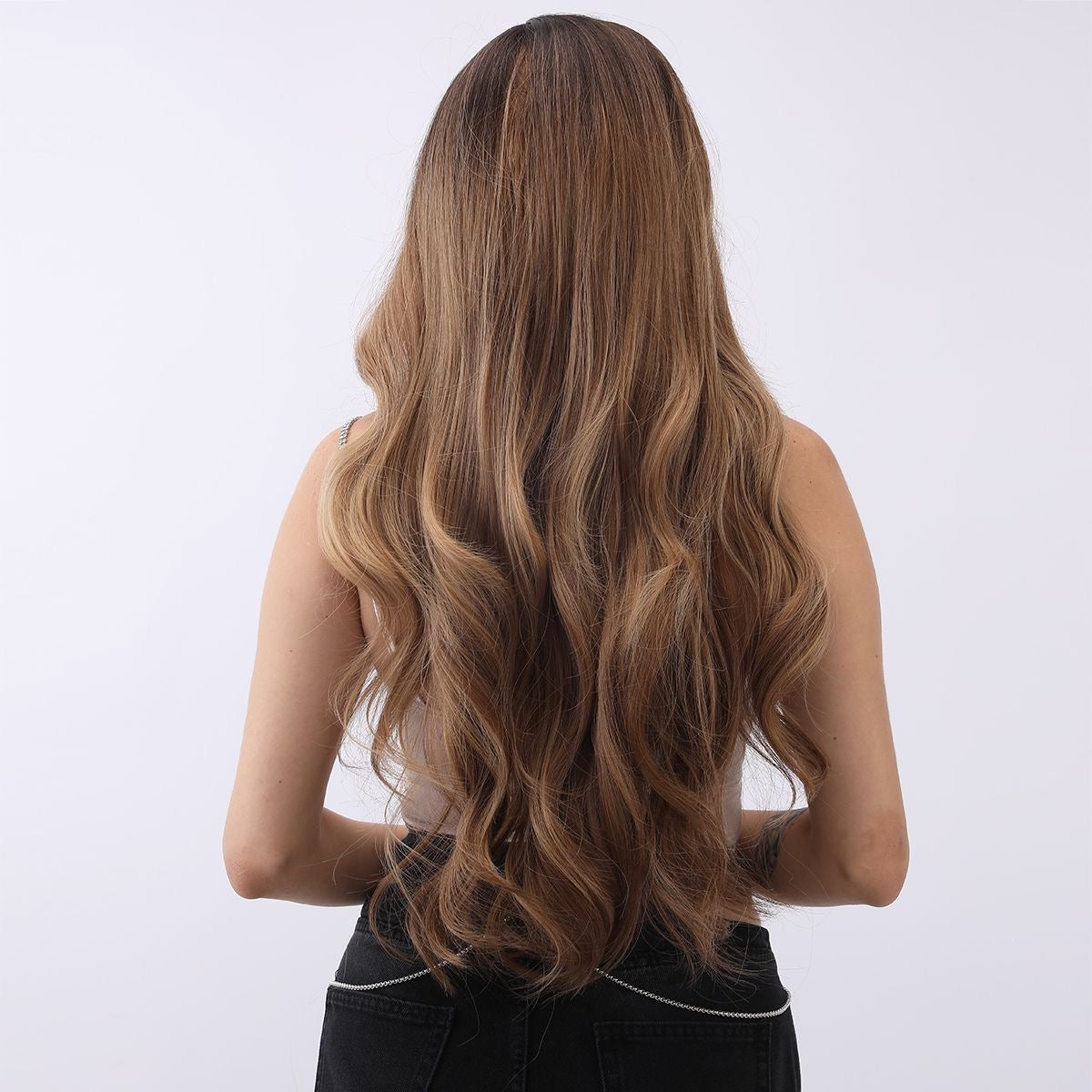 Long wavy chestnut-brown highlighted wig, layered waves from back view
