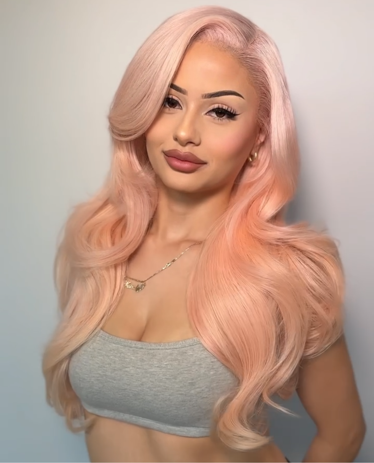 Wendy pink lace wig with long wavy hair, side part, voluminous layers