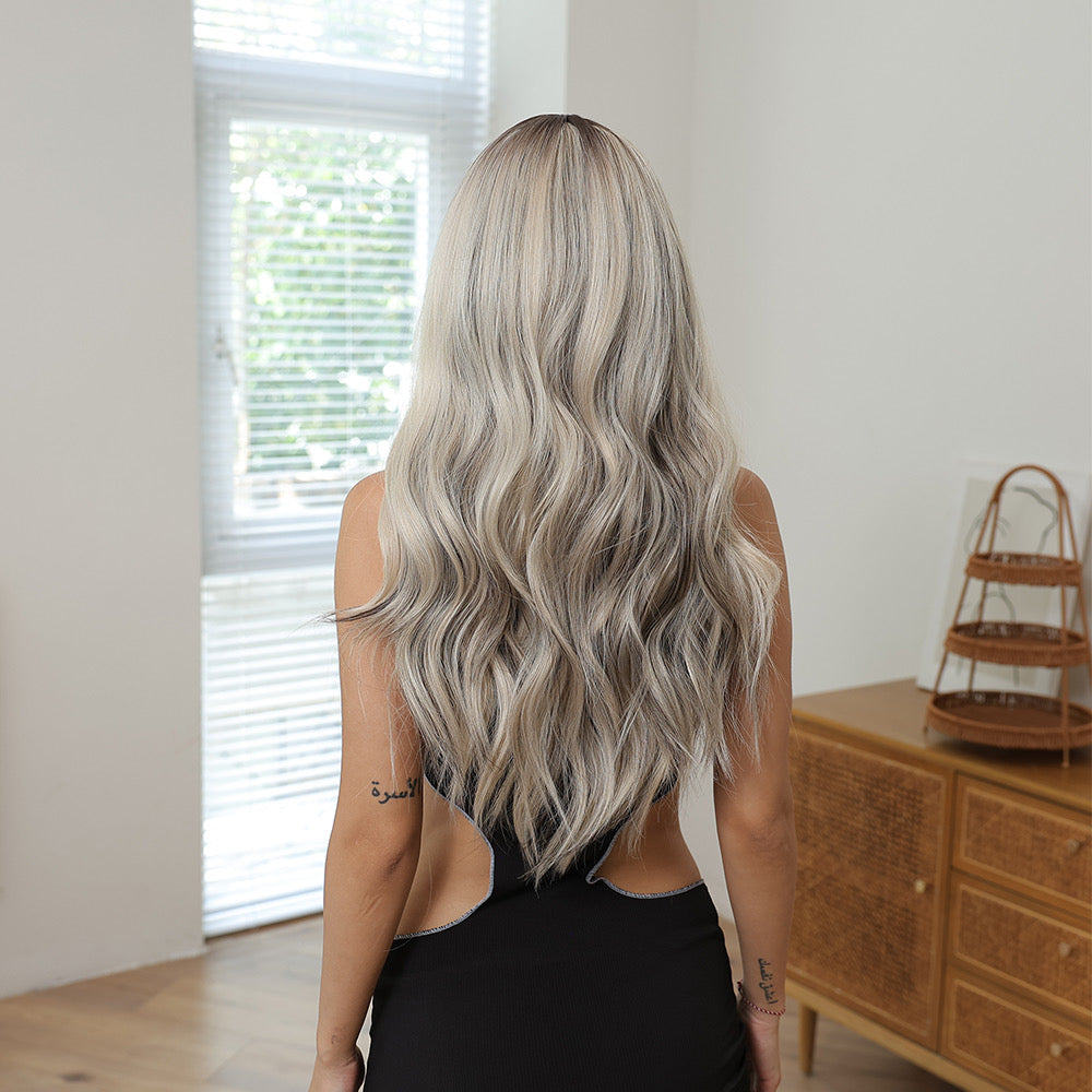 Long icy blonde wig viewed from back, wavy layers