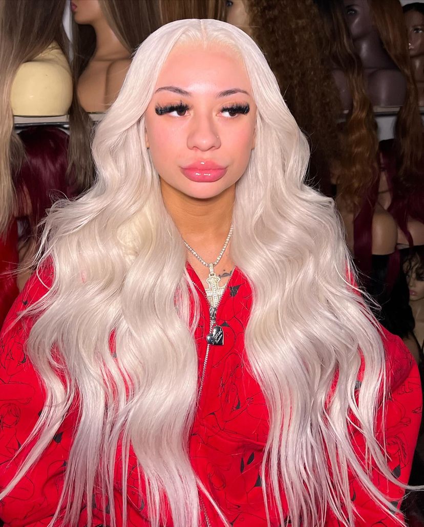 Lace front wig with long wavy silver hair, center part and soft volume