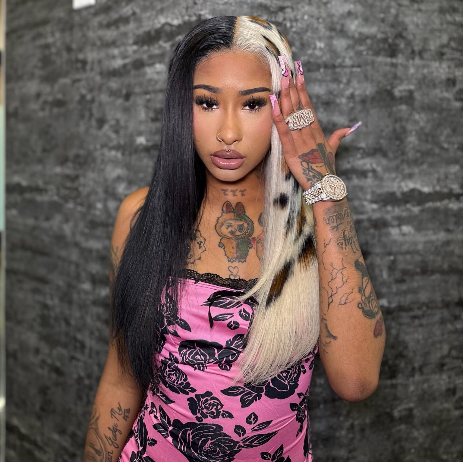 Split-style wig with long jet-black and blonde sections, leopard print highlights