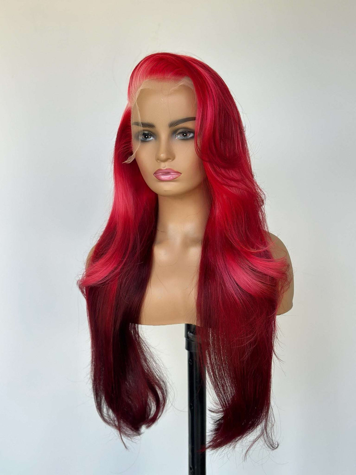 Lace front wig with long crimson red hair, loose waves and center part