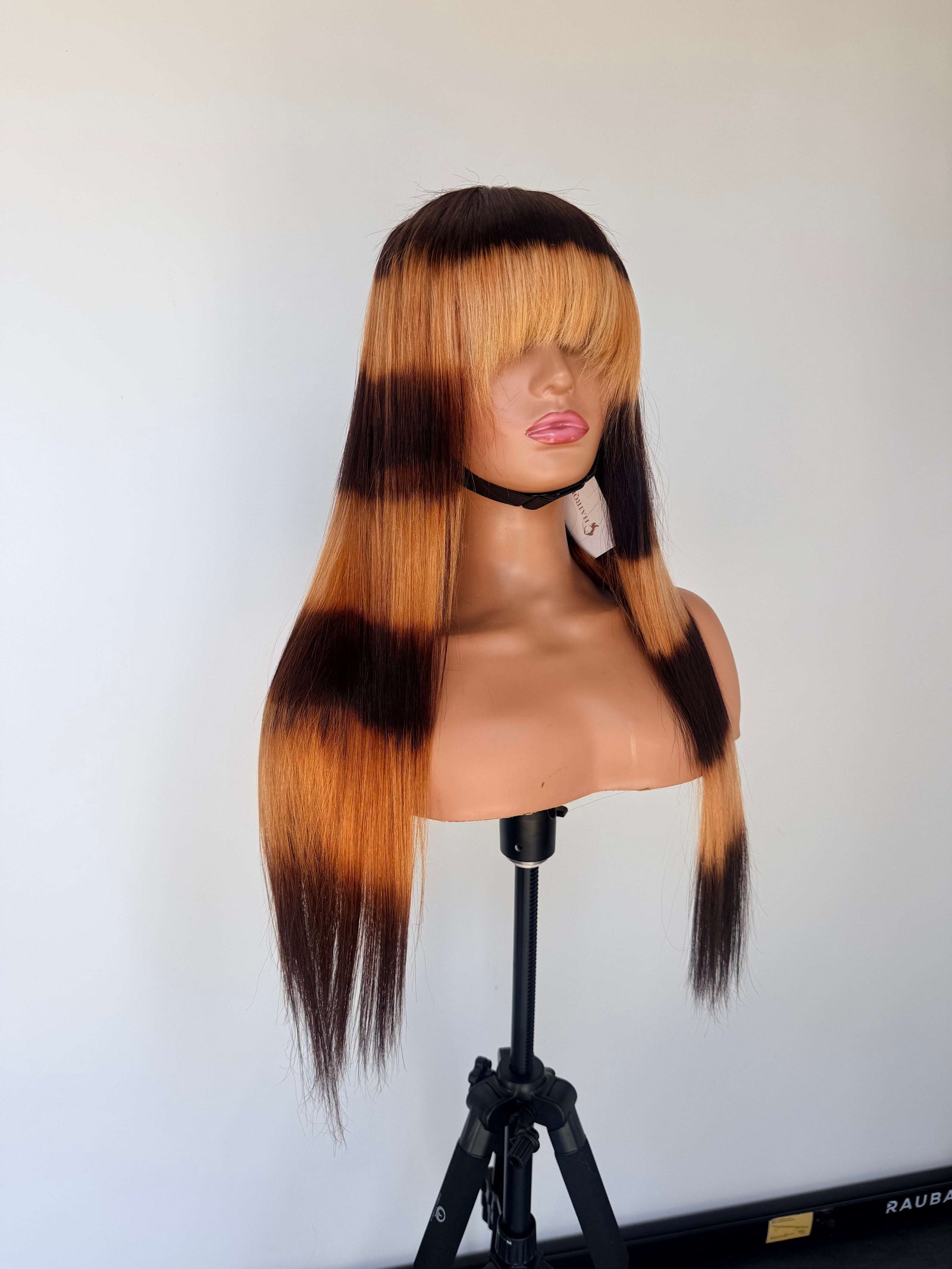 Striped lace wig in brown and blonde, long straight hair with blunt bangs