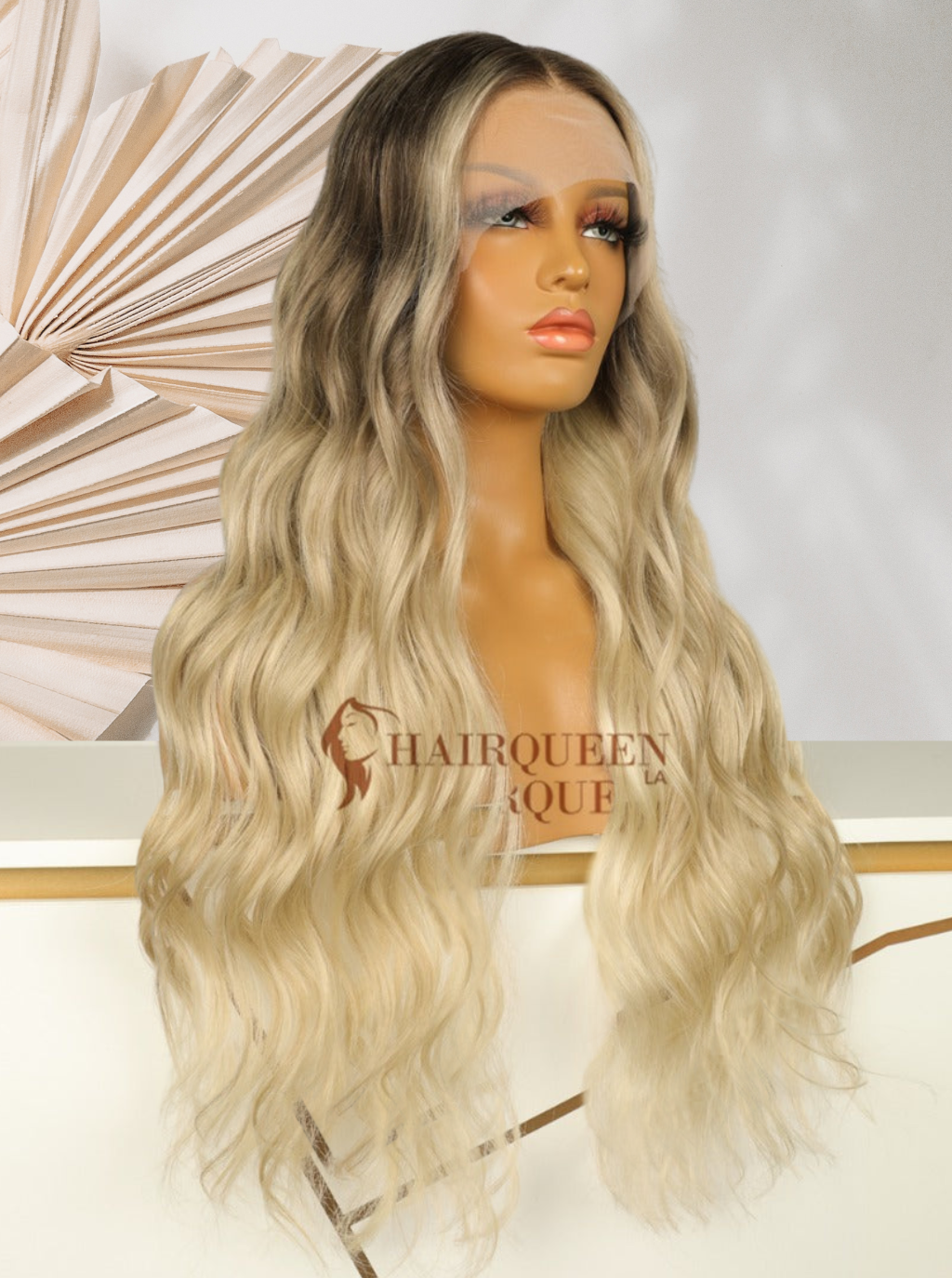 Lace wig with long wavy blonde hair, dark roots, side-swept part