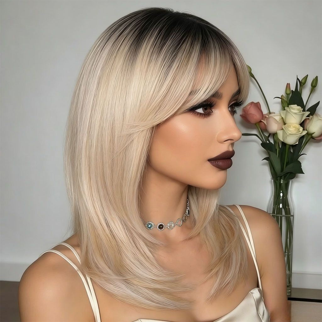 Synthetic wig with blonde curtain bangs and dark roots, long side-swept layers