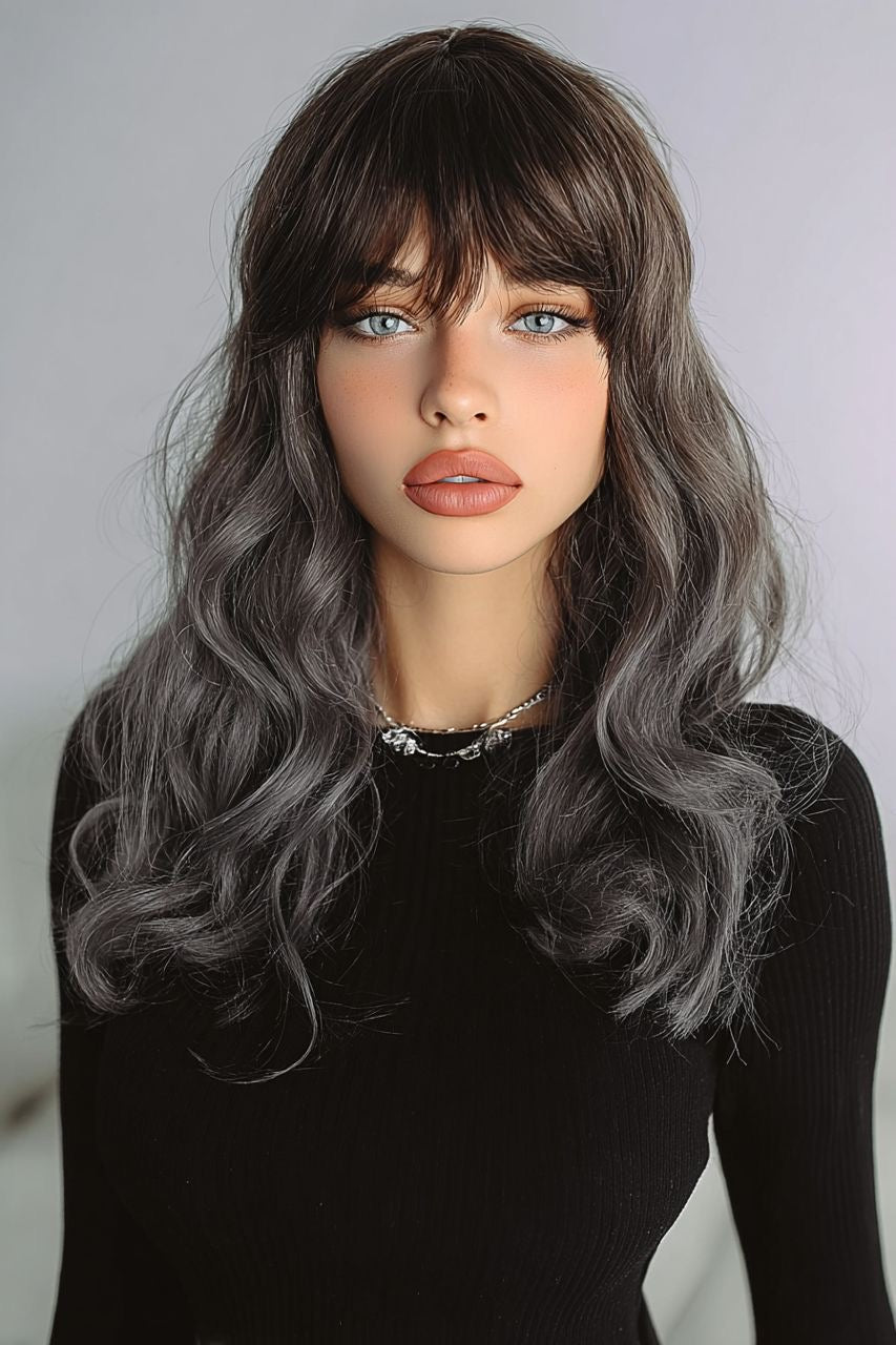 Long ombre synthetic wig with wavy dark-to-silver gray hair and bangs