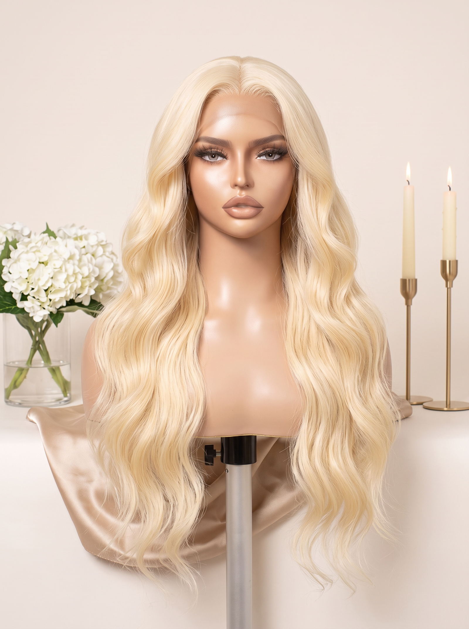 Long wavy 613 blonde lace wig on mannequin with natural hairline and volume