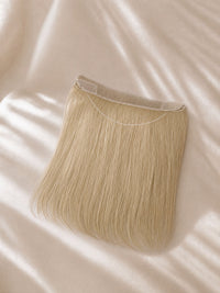 Blonde lace hairline topper with natural straight strands and sheer hairline base