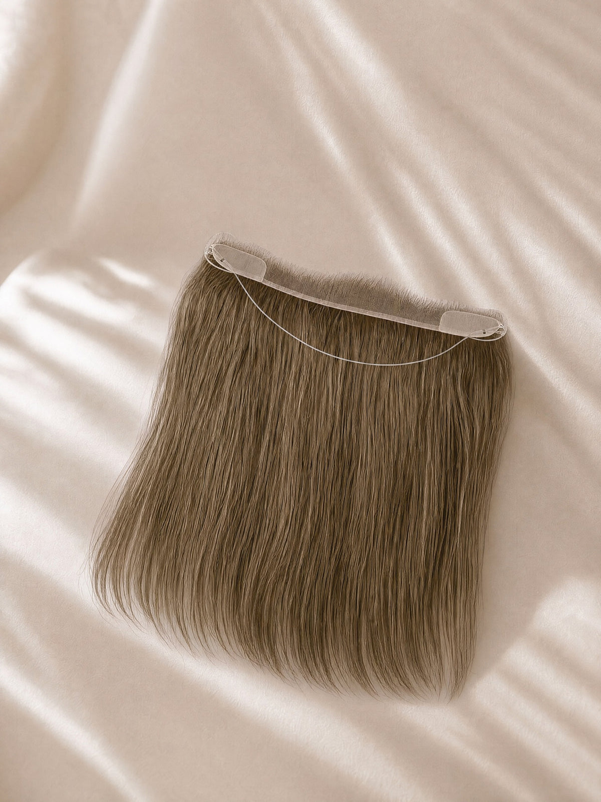 Curved hair topper with brown straight hair and thin transparent lace cap