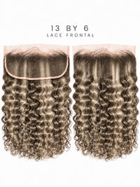 Lace front hairpiece with voluminous wavy curls, medium brown highlights