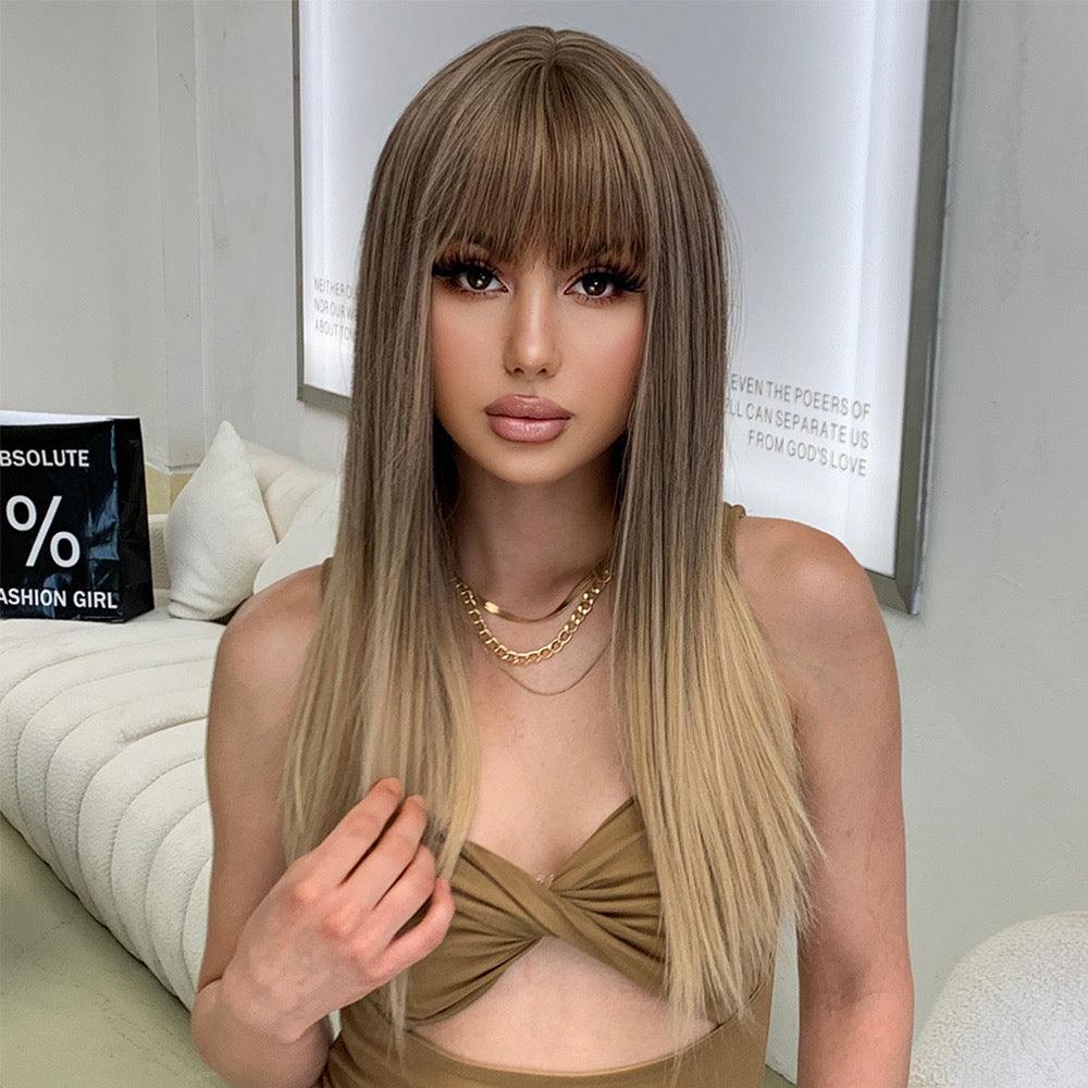 Long straight blonde wig with blunt bangs and subtle lowlight streaks