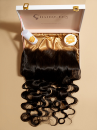 Black curly lace closure hair piece with loose waves inside open packaging