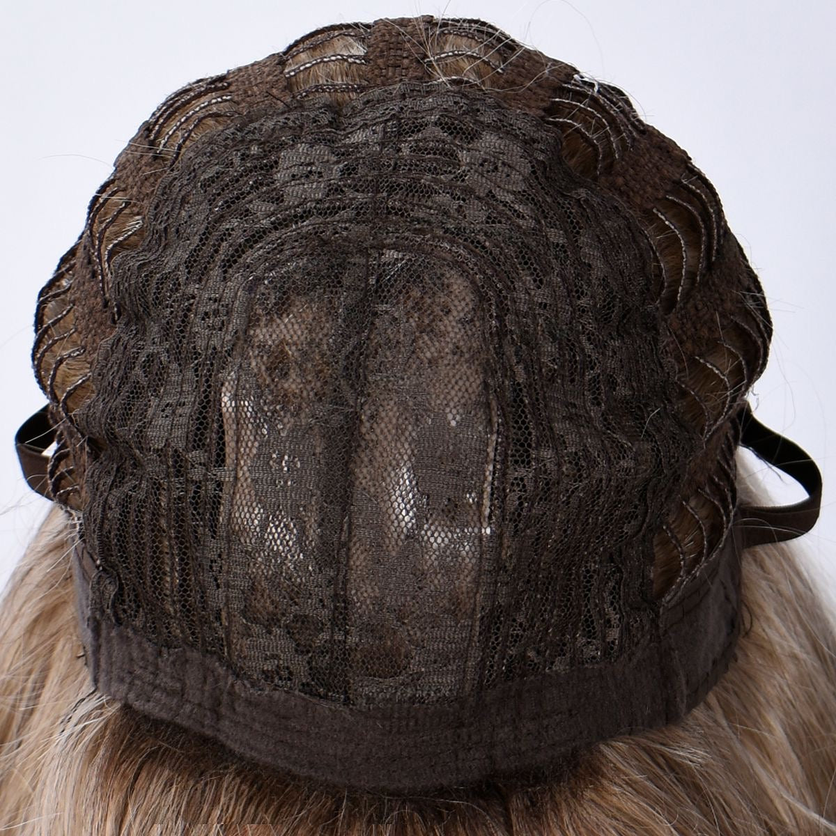 Wig cap interior with dark mesh lace and open weft, adjustable straps