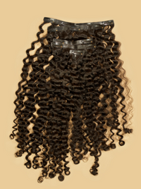 Curly clip-in hair extensions with seamless wefts, dark brown tight curls