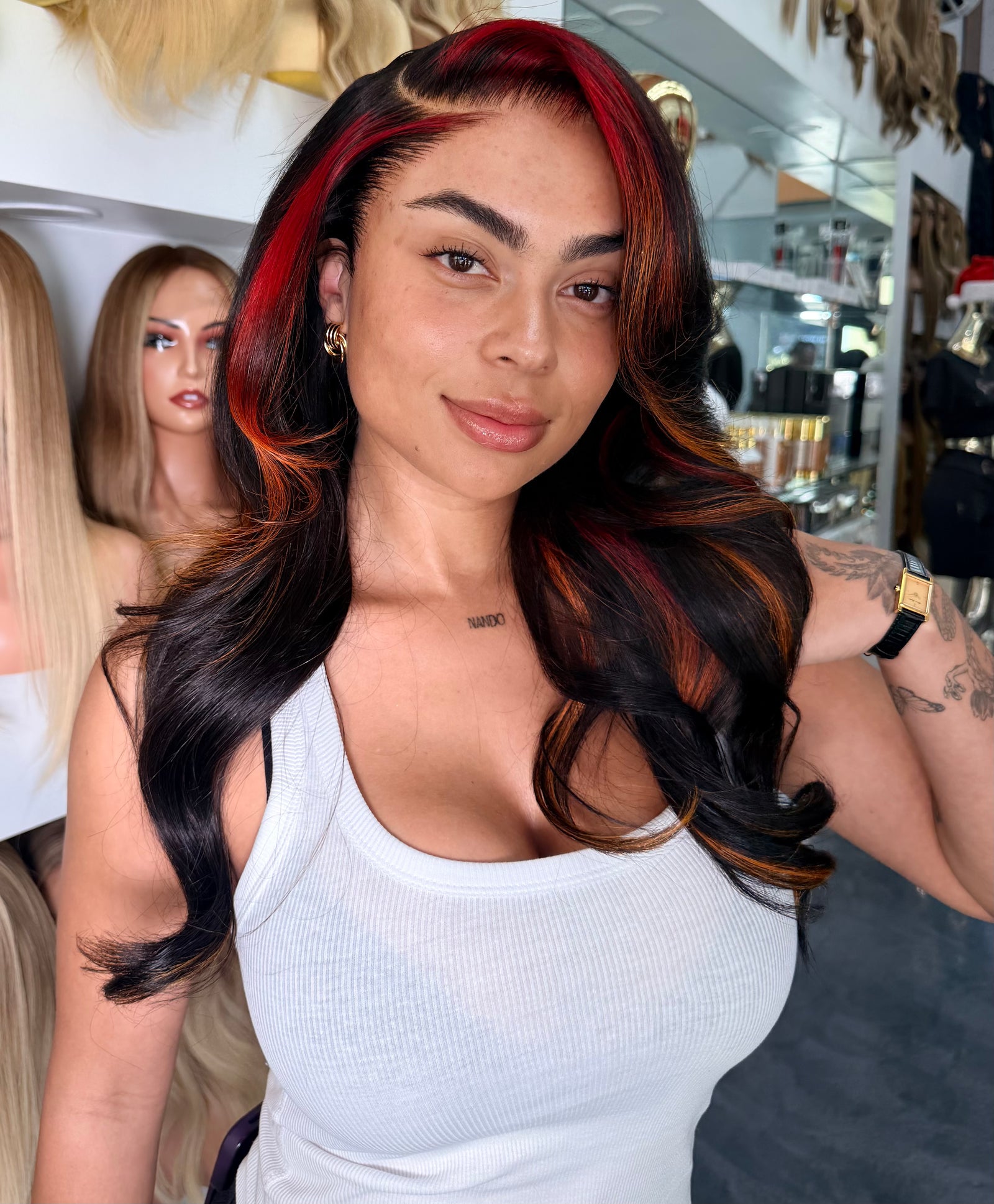 Dark wavy lace wig with red striped top and a natural-looking hairline