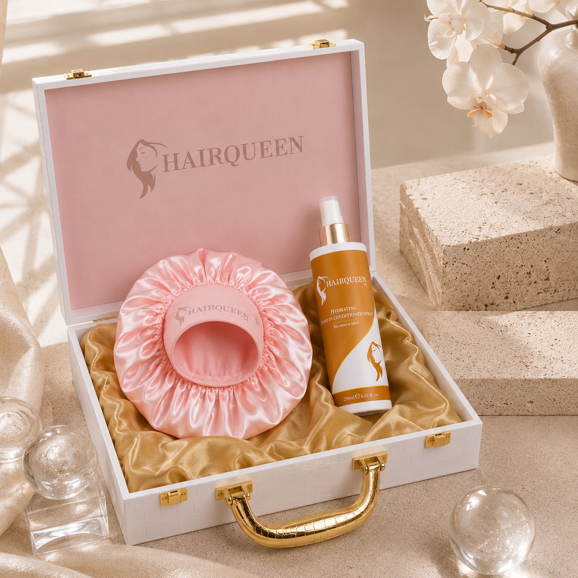Gift box set with pink satin hair extension cap and amber extension care bottle