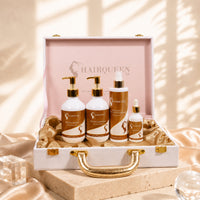 Hair care extension kit in open case with bottles: two large, one tall, two small
