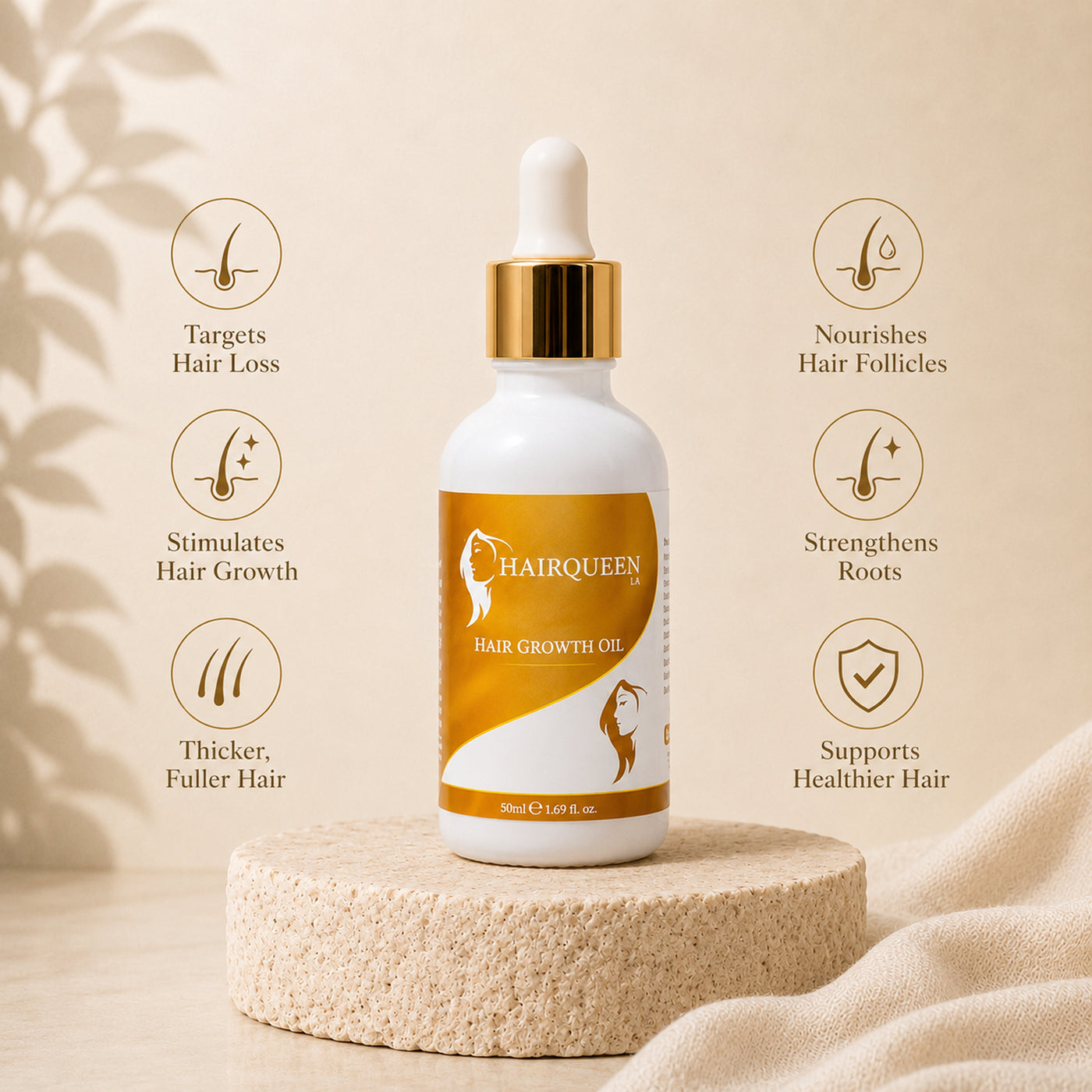 Hair Queen LA hair growth oil bottle with gold cap dropper