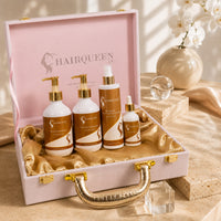 Hair care extension kit gift case with gold handle and four bottles