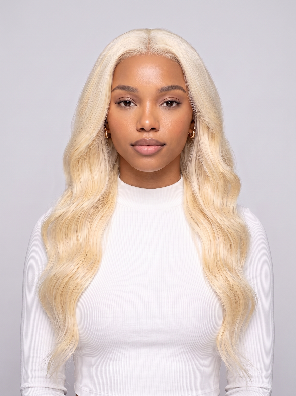 Blonde lace wig with long wavy hair, center part, natural hairline
