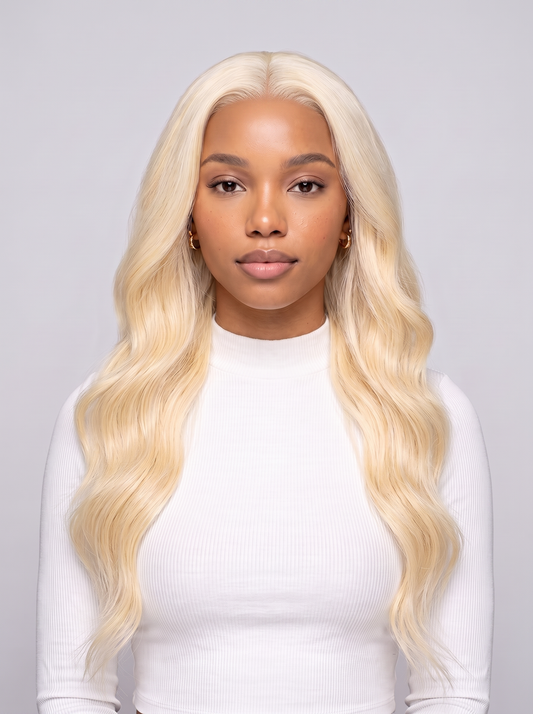 Blonde lace wig with long wavy hair, center part, natural hairline