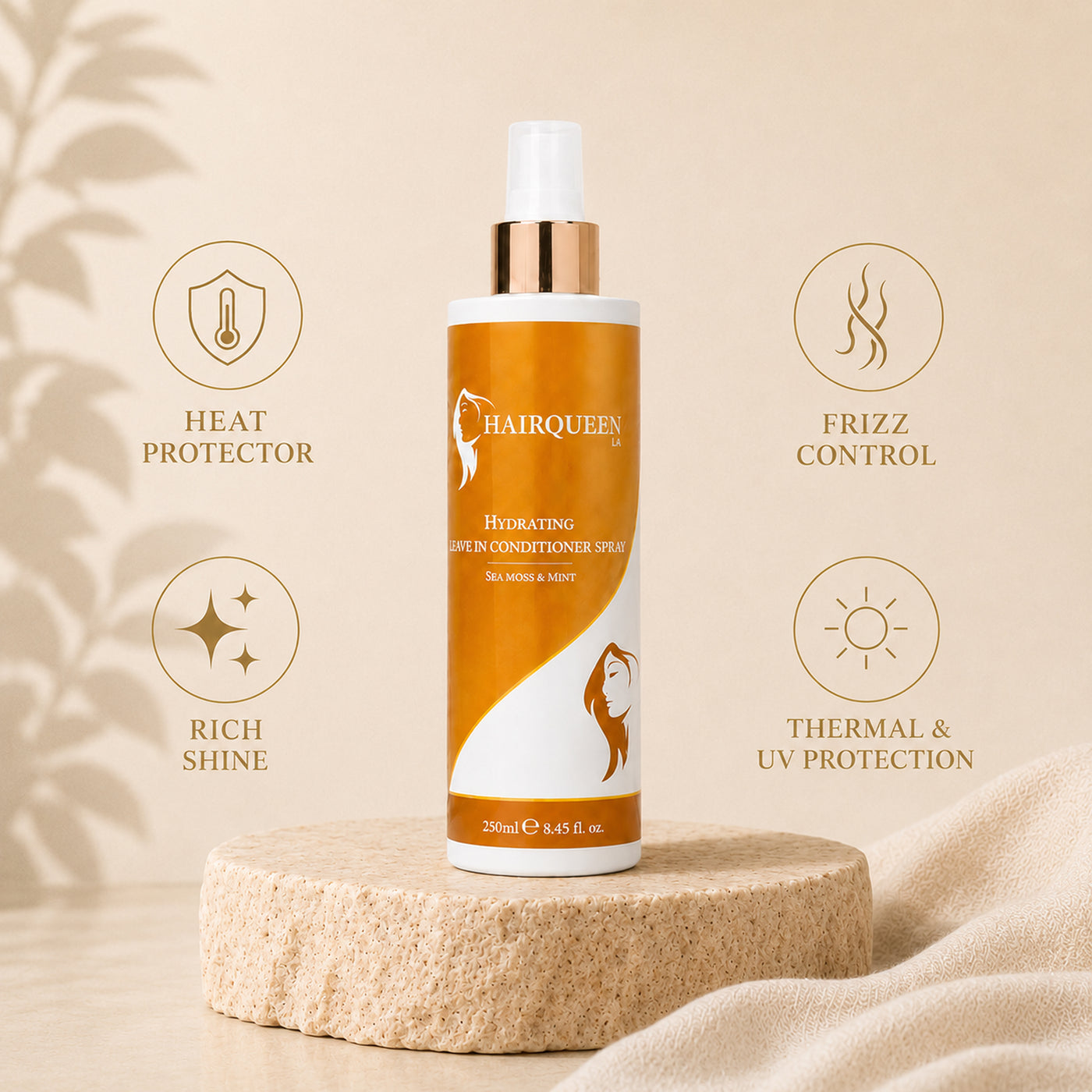 Hydrating leave-in conditioner spray bottle with feature icons; orange label, white cap; Hair Queen LA