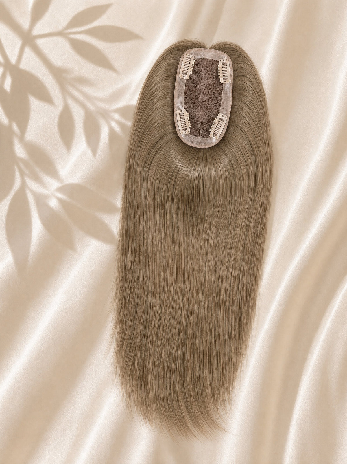 Wavy light-brown 3x5 mono hair topper with oval mono base on backing cloth