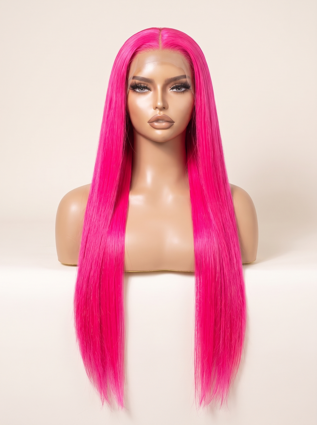 Hot pink lace wig on mannequin with long straight strands and center part.