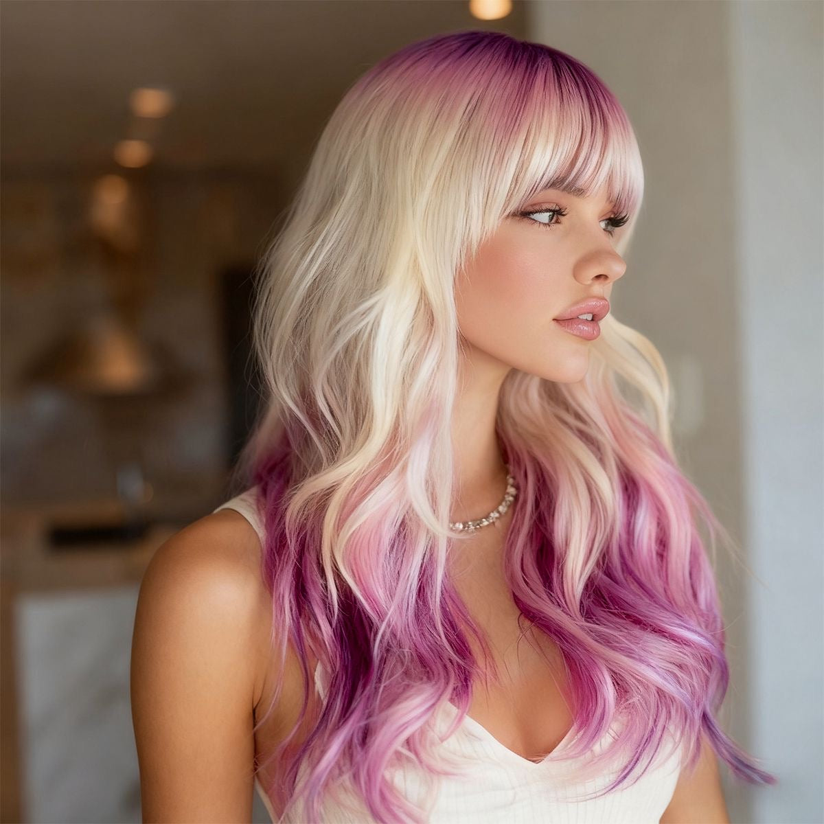 Synthetic blend wavy wig with blonde-to-pink ombre bangs and long wavy lengths