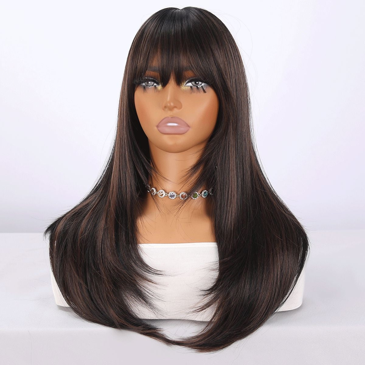 Long black synthetic wig with bangs and brown highlights, straight layered hair