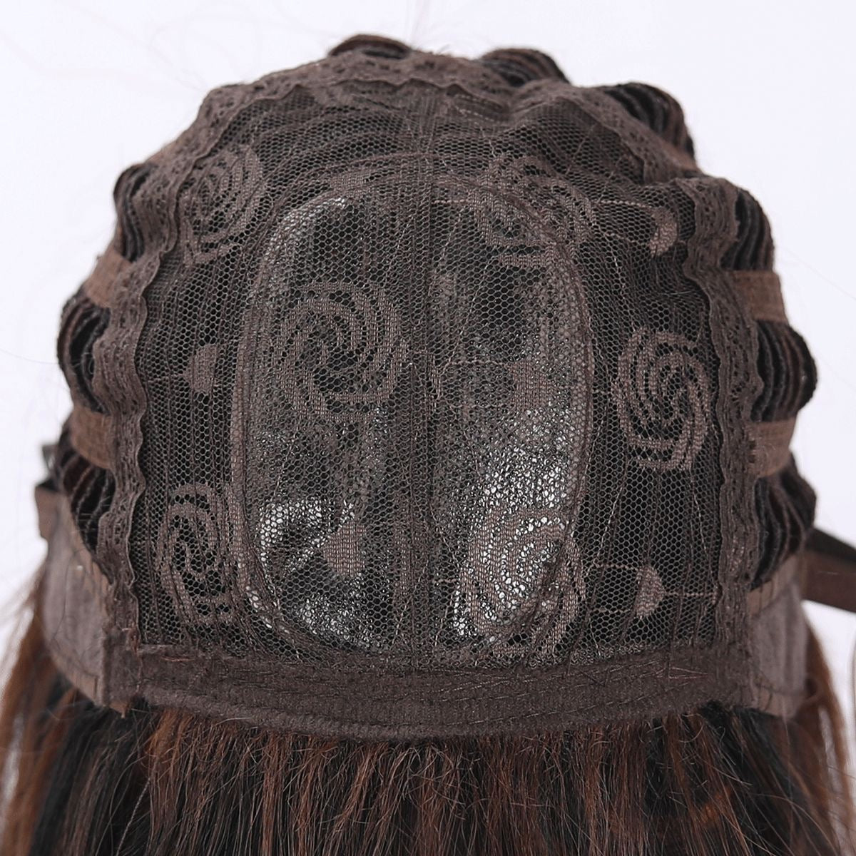 Synthetic wig cap with breathable mesh and curved seams, viewed from top
