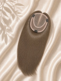 Clip-in mono hair topper with circular base, smooth dark brown hair curtain