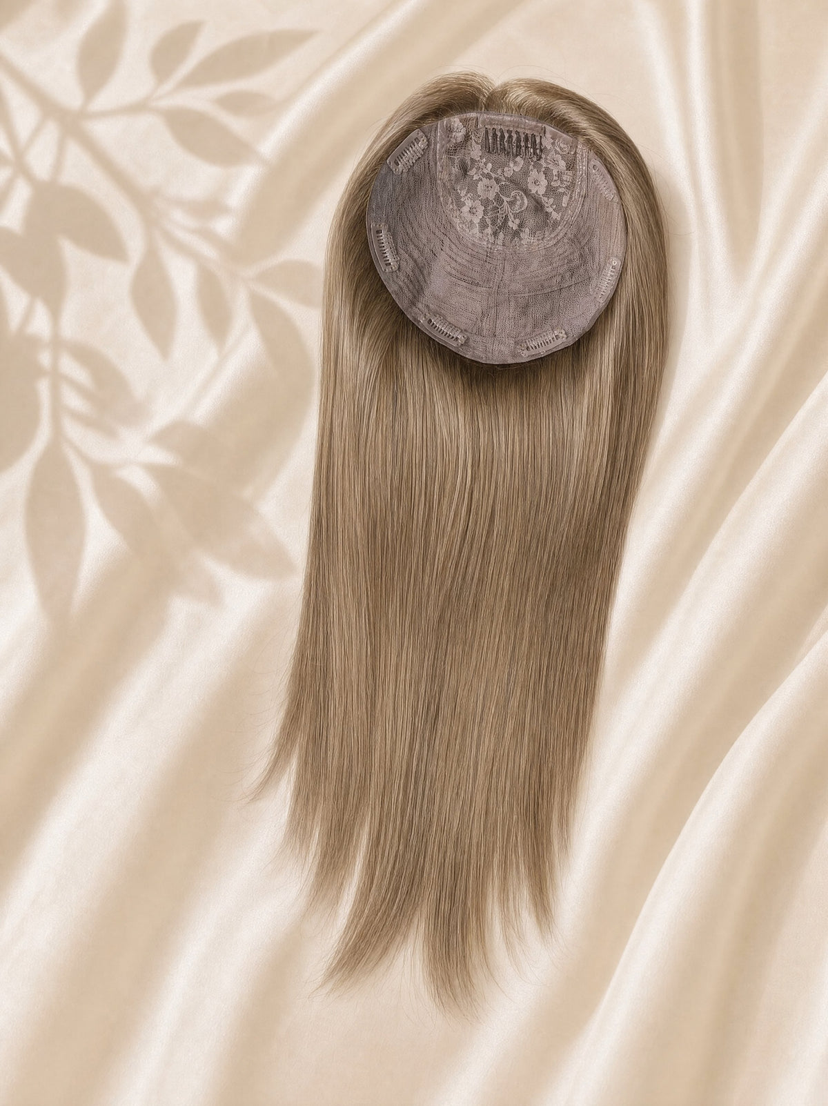 Clip-in silk base hair topper with light blonde straight hair, round gray base