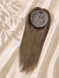 Silk base hair topper with light blonde straight hair, round mesh base detail