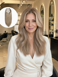 Silk skin hair topper worn by model, long wavy light blonde hair with seamless blend