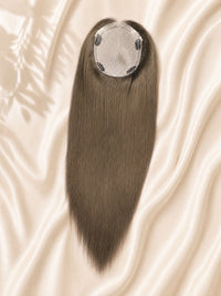 Silk skin hair topper with dark gray-brown straight strands and circular clip base
