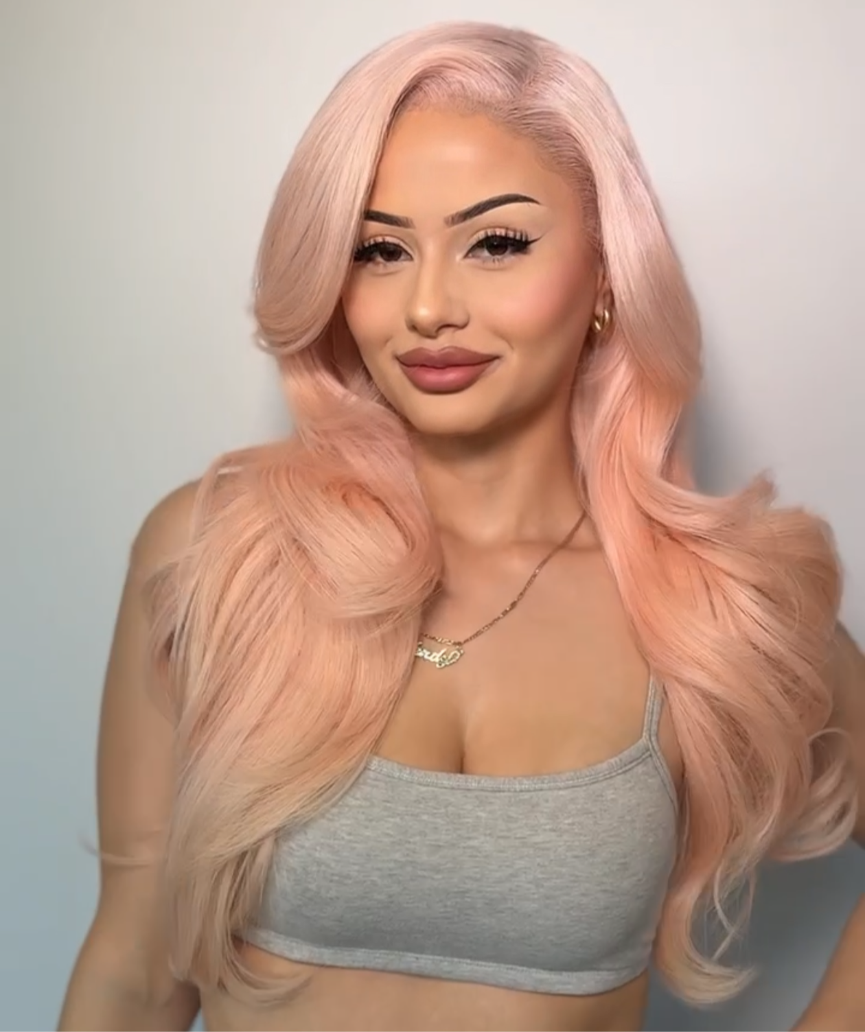 Wendy pink lace wig with long loose waves, side part, full volume around crown