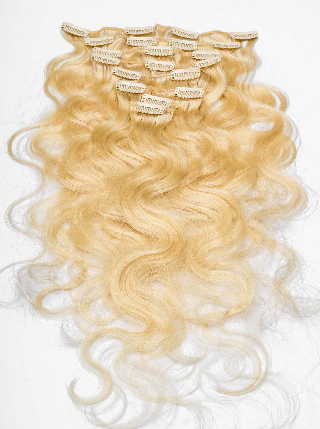 Clip-in hair extensions, long blonde wavy weave with attached snap clips