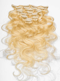 Clip-in hair extensions, long blonde wavy weave with attached snap clips