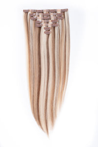 Blonde blend seamless clip-in hair extensions with small top clips, long straight strands