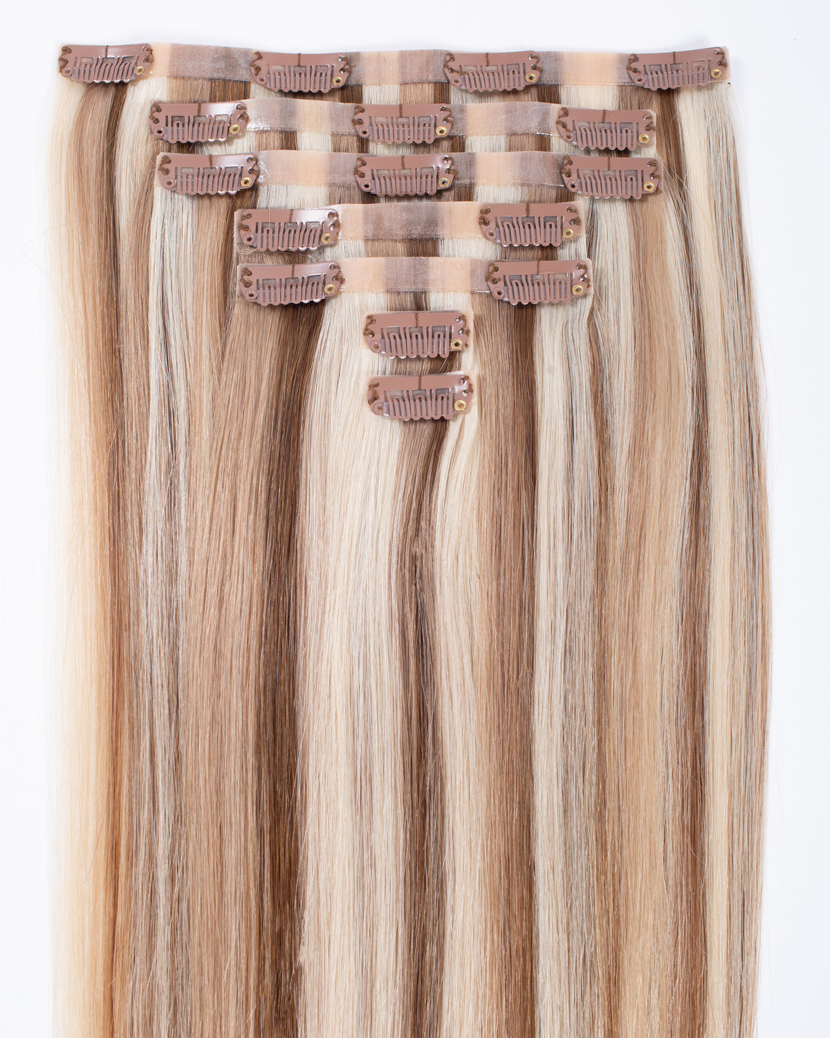 Blonde blend seamless clip-in hair extensions showing multiple top clips, straight hair