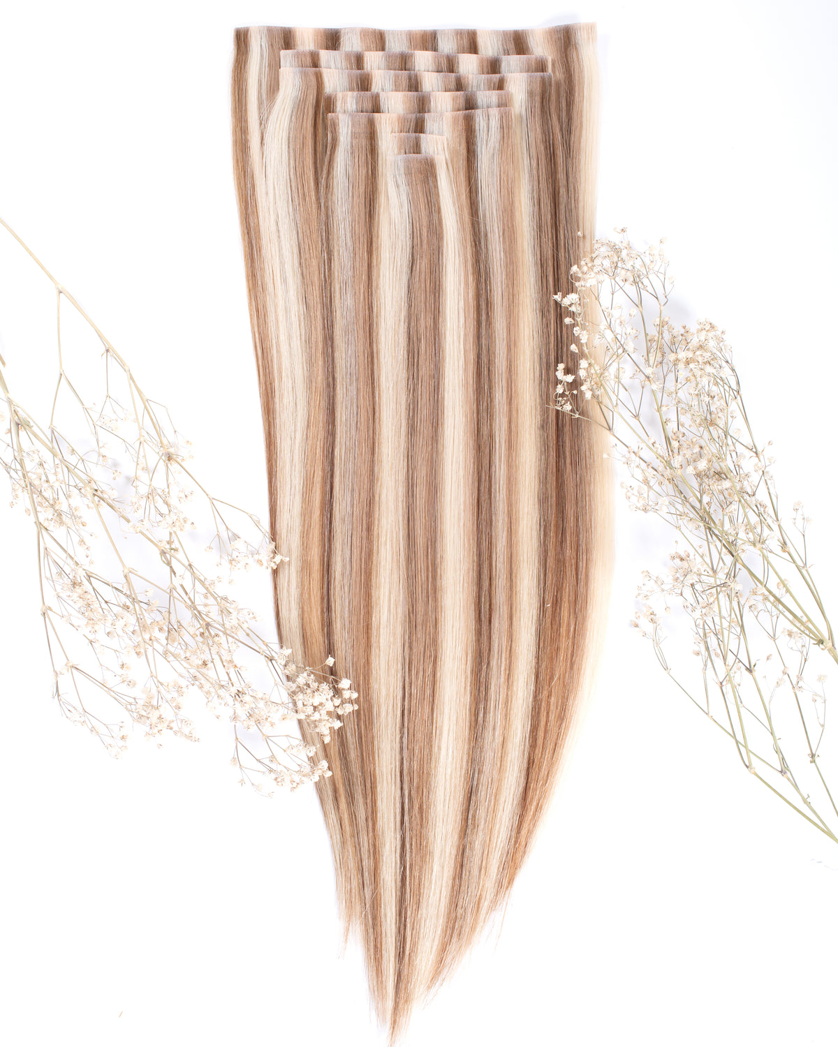 Blonde blend seamless clip-in hair extensions with top clips, long straight strands