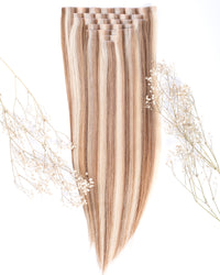 Blonde blend seamless clip-in hair extensions with top clips, long straight strands