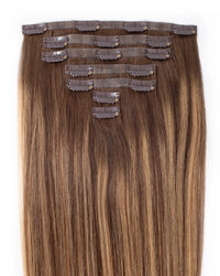 Caramel blend clip-in hair extensions top view with multiple snap clips