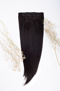 Off-black clip-in hair extensions, long straight weft with smooth top