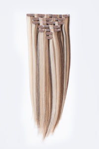Clip-in hair extensions: vanilla-blend straight strands with visible clips