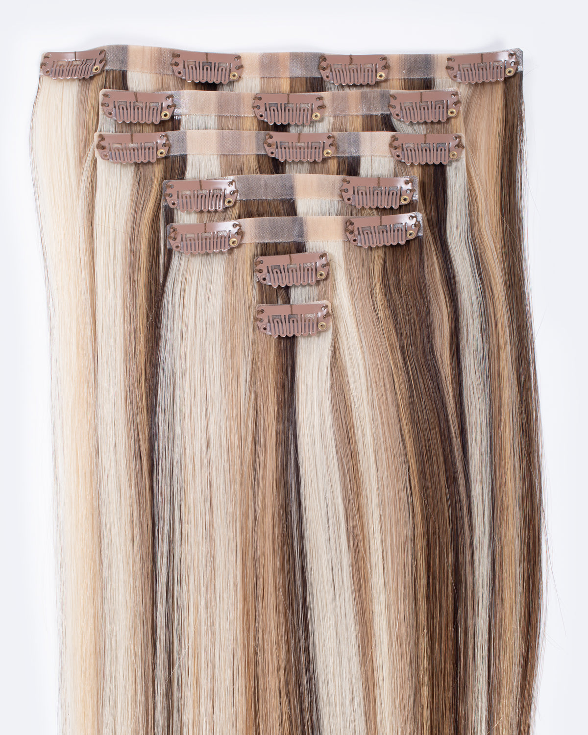 Clip-in hair extensions panel with multiple clips; light blonde and brown strands