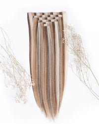 Clip-in hair extensions: long straight vanilla-blend strands with clip attachment